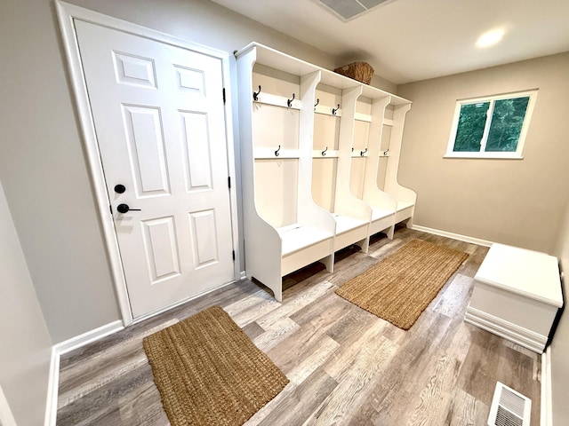 13955 Rattalee Lake Rd, Davisburg, MI 48350 - mudroom featuring wood finished floors and baseboards