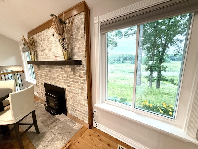 13955 Rattalee Lake Rd, Davisburg, MI 48350 - living room with plenty of natural light, wood finished floors, and lofted ceiling