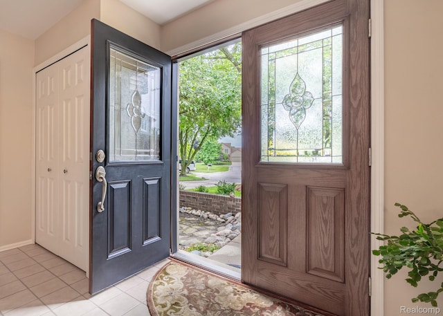 2732 Winter Park Ct, Rochester Hills, MI 48309 - foyer with light tile patterned flooring and baseboards