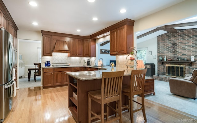 2732 Winter Park Ct, Rochester Hills, MI 48309 - kitchen featuring freestanding refrigerator, custom range hood, light wood-style flooring, a peninsula, and recessed lighting