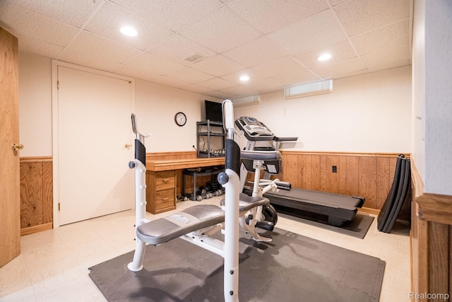 2732 Winter Park Ct, Rochester Hills, MI 48309 - workout area featuring wainscoting, wood walls, a drop ceiling, tile patterned floors, and recessed lighting