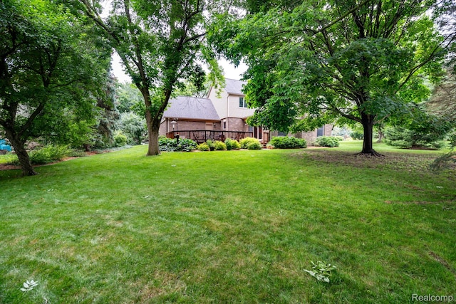2732 Winter Park Ct, Rochester Hills, MI 48309 - view of green lawn with a deck