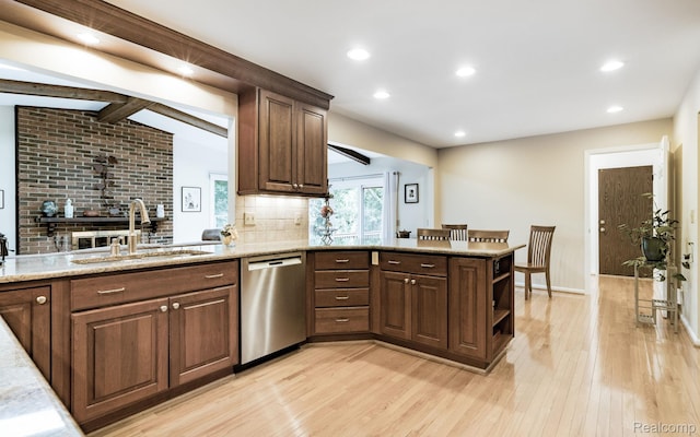 2732 Winter Park Ct, Rochester Hills, MI 48309 - kitchen featuring dishwasher, light wood-type flooring, a peninsula, tasteful backsplash, and light stone countertops