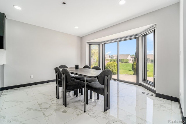 53242 Clarion Dr, Macomb, MI 48042 - dining room with light marble finish floors and recessed lighting