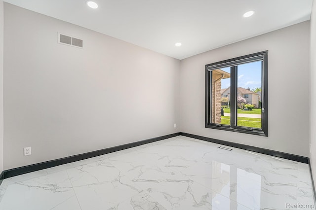 53242 Clarion Dr, Macomb, MI 48042 - spare room with marble finish flooring and recessed lighting