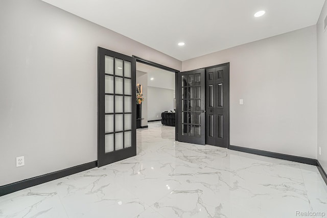 53242 Clarion Dr, Macomb, MI 48042 - spare room with marble tiled flooring, recessed lighting, and french doors