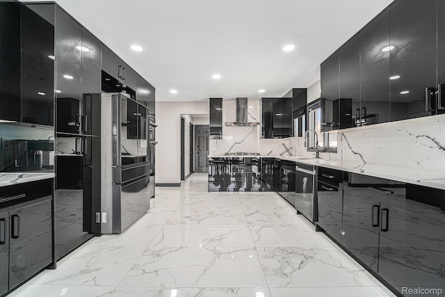 53242 Clarion Dr, Macomb, MI 48042 - kitchen featuring dark cabinetry, wall chimney exhaust hood, modern cabinets, appliances with stainless steel finishes, and recessed lighting