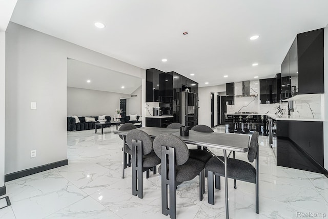 53242 Clarion Dr, Macomb, MI 48042 - dining room with recessed lighting and light marble finish floors
