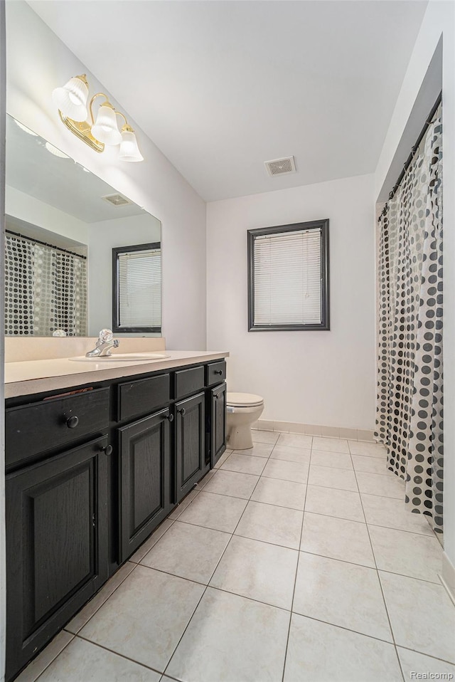 53242 Clarion Dr, Macomb, MI 48042 - bathroom featuring vanity and tile patterned floors