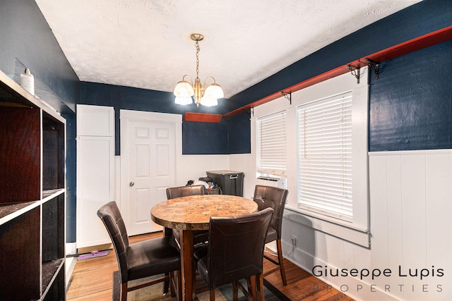 612 Norman St, Lansing, MI 48910 - dining room featuring wood finished floors and a chandelier