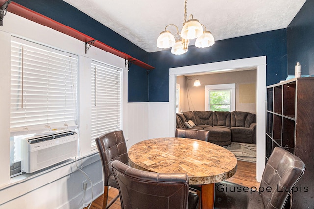 612 Norman St, Lansing, MI 48910 - dining room featuring a chandelier and wood finished floors