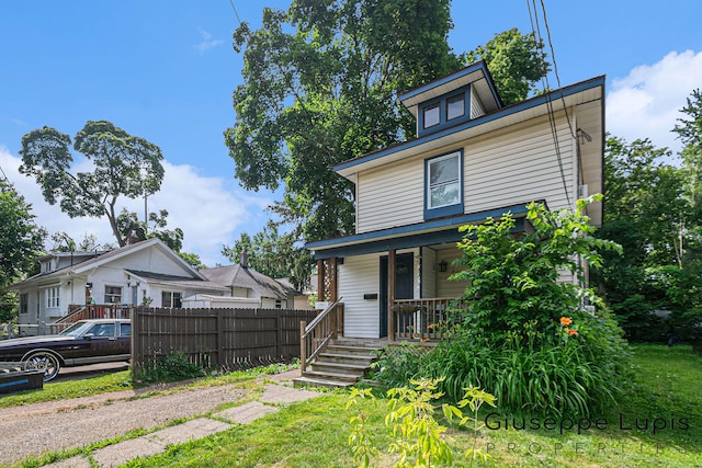 612 Norman St, Lansing, MI 48910 - view of front of property with a porch