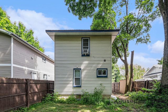 612 Norman St, Lansing, MI 48910 - back of house with a fenced backyard and cooling unit