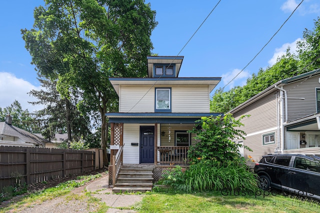 612 Norman St, Lansing, MI 48910 - american foursquare style home with a porch
