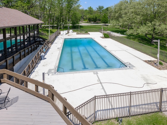 4040 Greenleaf Cir Unit 108, Kalamazoo, MI 49008 - view of pool with view of scattered trees and a patio