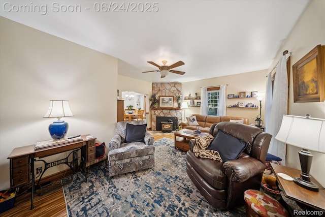 8450 Rosbolt Rd, Willis, MI 48191 - living area featuring a ceiling fan and wood finished floors