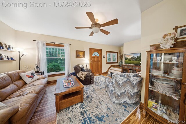 8450 Rosbolt Rd, Willis, MI 48191 - living room with wood finished floors and a ceiling fan