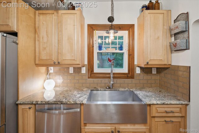 8450 Rosbolt Rd, Willis, MI 48191 - kitchen featuring stainless steel appliances, tasteful backsplash, light brown cabinetry, and light stone counters