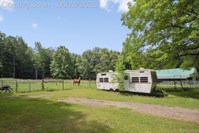 8450 Rosbolt Rd, Willis, MI 48191 - view of yard with a storage unit