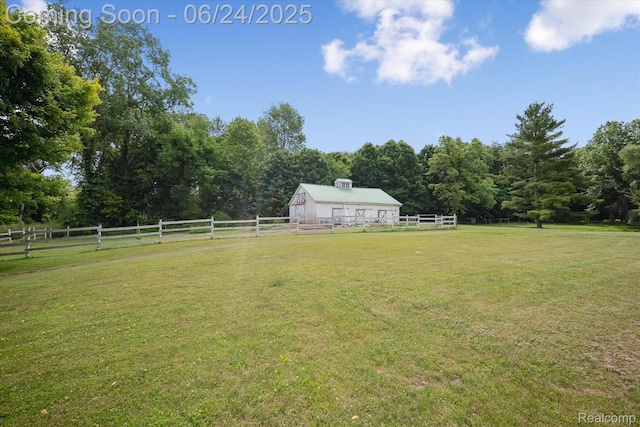 8450 Rosbolt Rd, Willis, MI 48191 - view of yard with an outbuilding, a rural view, and a view of trees
