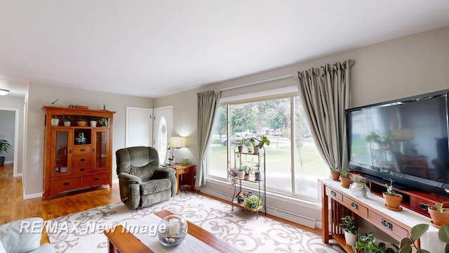 5071 Heidi Ln, Saginaw, MI 48604 - living room with light wood-type flooring and baseboards