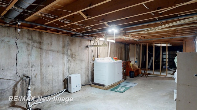 5071 Heidi Ln, Saginaw, MI 48604 - unfinished basement featuring washer and dryer