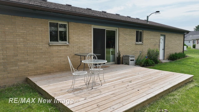 5071 Heidi Ln, Saginaw, MI 48604 - deck featuring a lawn
