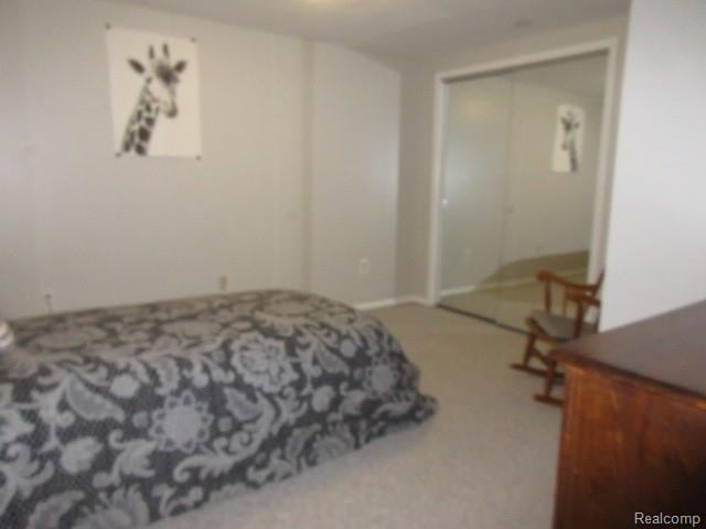 3521 Brandt Ln, Metamora, MI 48455 - carpeted bedroom featuring a closet