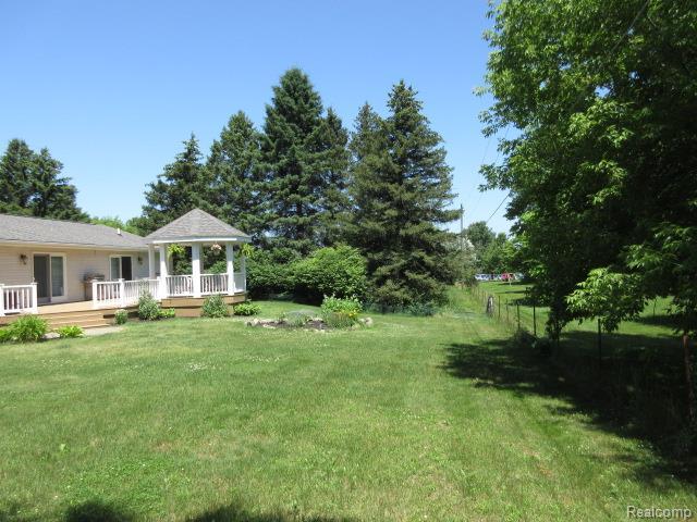 3521 Brandt Ln, Metamora, MI 48455 - view of yard featuring a gazebo and a deck