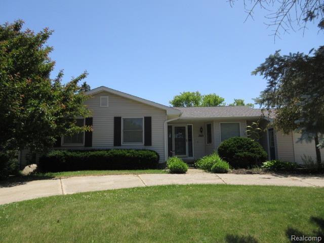 3521 Brandt Ln, Metamora, MI 48455 - ranch-style house featuring a front lawn