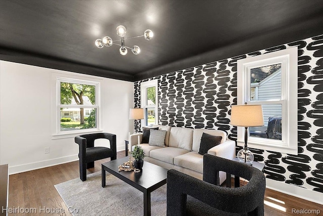 2718 Hubbard St, Dearborn, MI 48124 - living area featuring wood finished floors and a chandelier