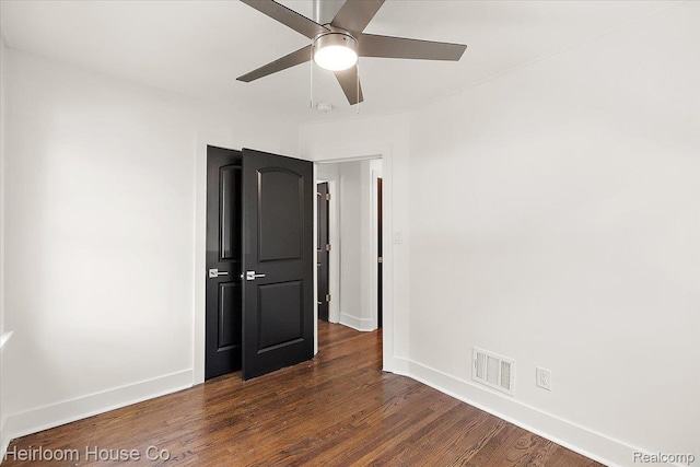 2718 Hubbard St, Dearborn, MI 48124 - spare room featuring a ceiling fan and dark wood-style floors