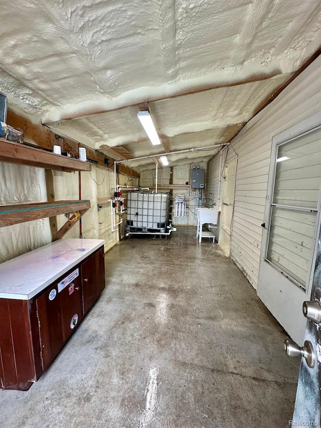4502 E Wilkinson Rd, Owosso, MI 48867 - garage with a sink and electric panel