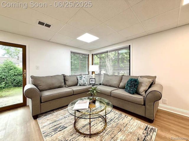 2526 Genes Dr, West Bloomfield, MI 48326 - living room featuring wood finished floors and a paneled ceiling