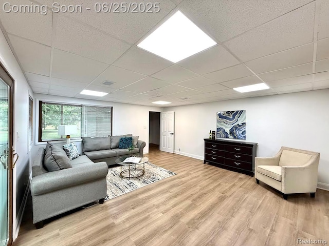 2526 Genes Dr, West Bloomfield, MI 48326 - living area with wood finished floors and a paneled ceiling