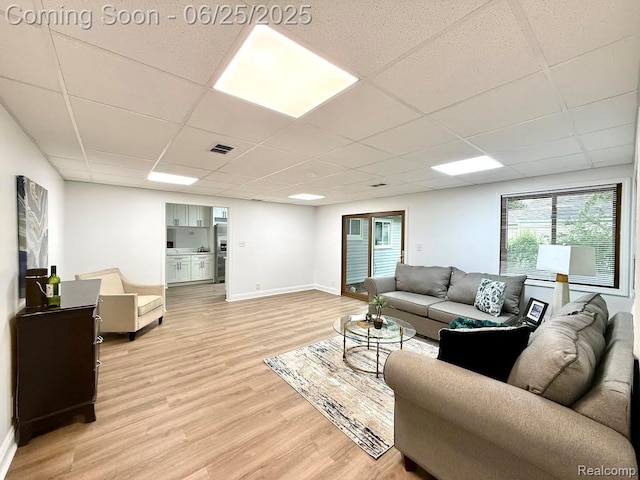 2526 Genes Dr, West Bloomfield, MI 48326 - living room featuring a drop ceiling and light wood finished floors