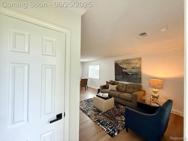 2526 Genes Dr, West Bloomfield, MI 48326 - living area featuring wood finished floors