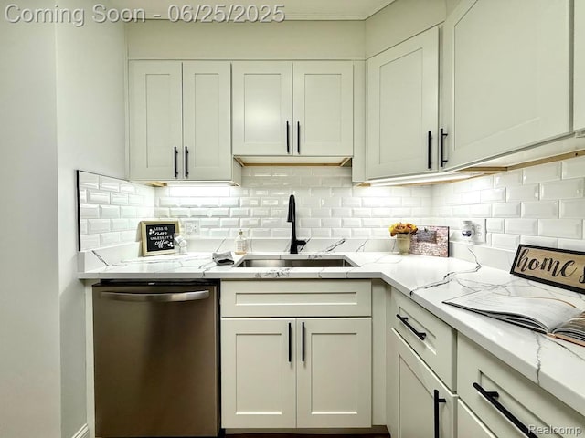 2526 Genes Dr, West Bloomfield, MI 48326 - kitchen featuring stainless steel dishwasher, decorative backsplash, and light stone countertops