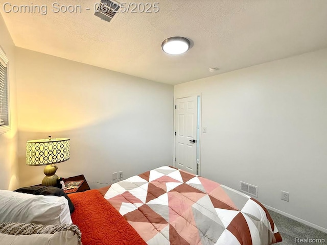 2526 Genes Dr, West Bloomfield, MI 48326 - carpeted bedroom featuring a textured ceiling
