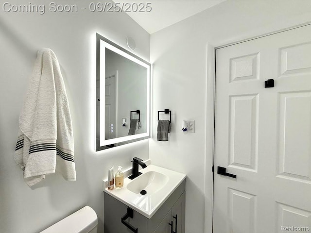 2526 Genes Dr, West Bloomfield, MI 48326 - half bathroom featuring vanity and toilet