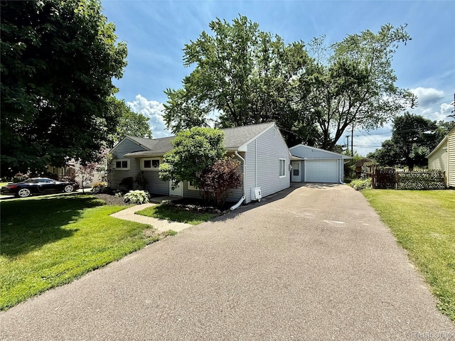 2526 Genes Dr, West Bloomfield, MI 48326 - obstructed view of property with a detached garage, asphalt driveway, and a front yard