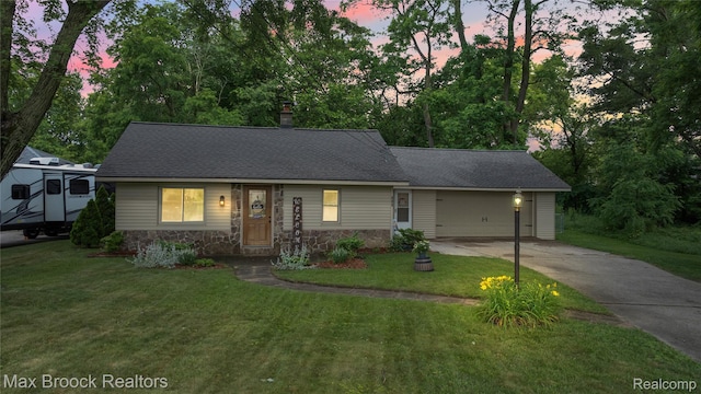 888 Mallock Rd, White Lake, MI 48386 - view of front of home featuring stone siding, driveway, a front yard, and a shingled roof