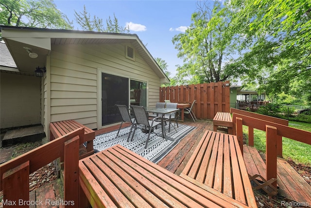 888 Mallock Rd, White Lake, MI 48386 - wooden terrace with outdoor dining area