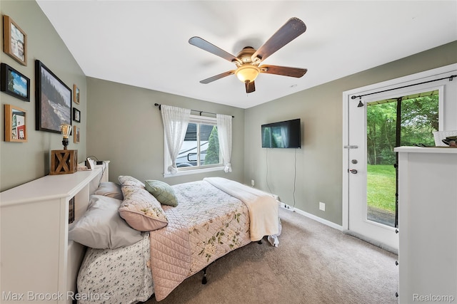 888 Mallock Rd, White Lake, MI 48386 - carpeted bedroom with access to exterior and ceiling fan