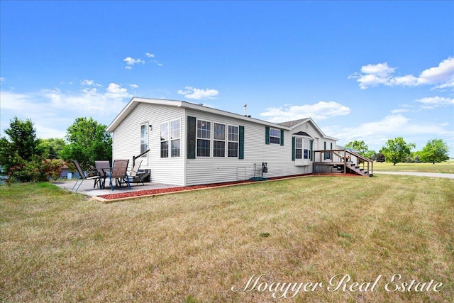 3516 140th Ave, Hamilton, MI 49419 - rear view of property featuring a patio and a yard