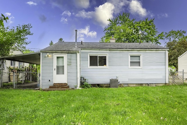 241 Dakota Ave, Ypsilanti, MI 48198 - rear view of house with entry steps and a chimney