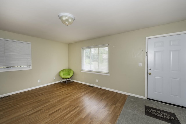 241 Dakota Ave, Ypsilanti, MI 48198 - foyer entrance with wood finished floors and baseboards