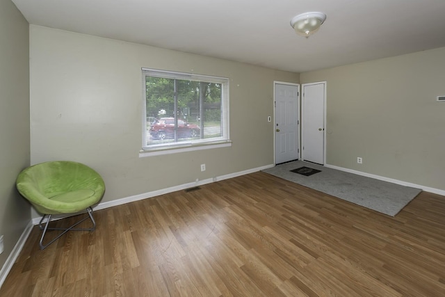 241 Dakota Ave, Ypsilanti, MI 48198 - entrance foyer featuring baseboards and wood finished floors