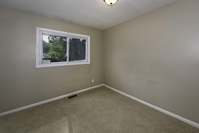 241 Dakota Ave, Ypsilanti, MI 48198 - spare room with carpet flooring and baseboards