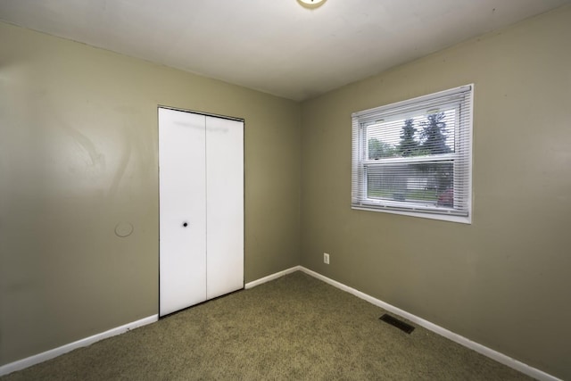 241 Dakota Ave, Ypsilanti, MI 48198 - unfurnished bedroom with carpet flooring and a closet